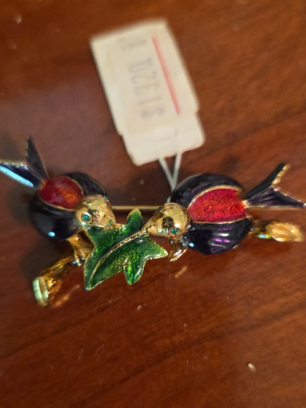 Vintage Enamel Hummingbird Brooch with Green Leaf Accent